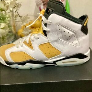 WHITE AND YELLOW JORDANS